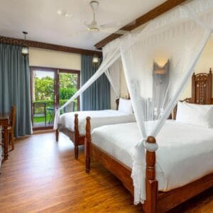 GUEST ROOM-2 TWINS,PARTIAL OCEAN,BALCONY